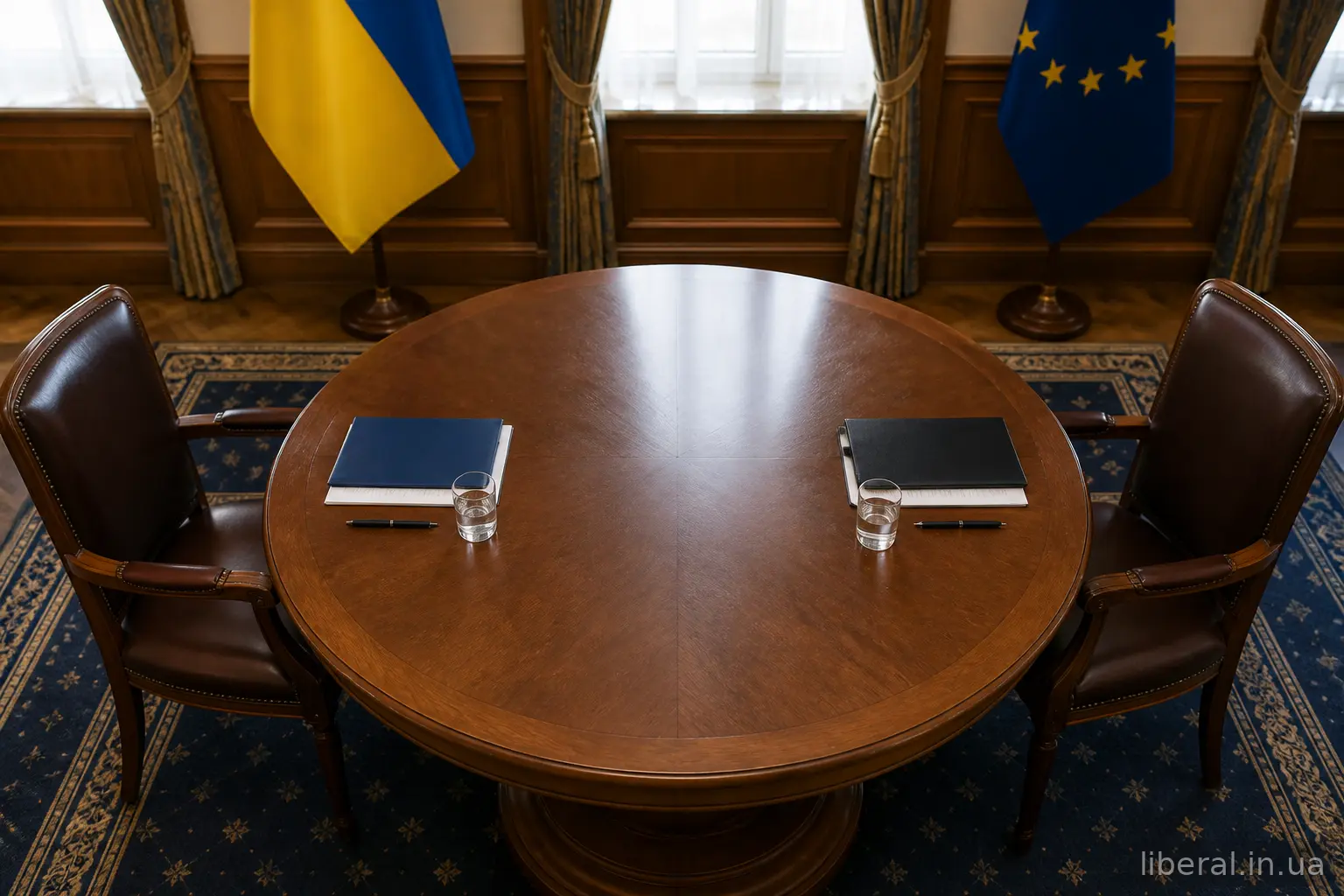 Круглий стіл переговорів з двома кріслами навпроти одне одного